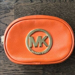 Michael Kors small orange travel bag